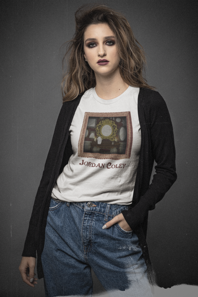 Young woman wearing No Need for Grace album art T-shirt